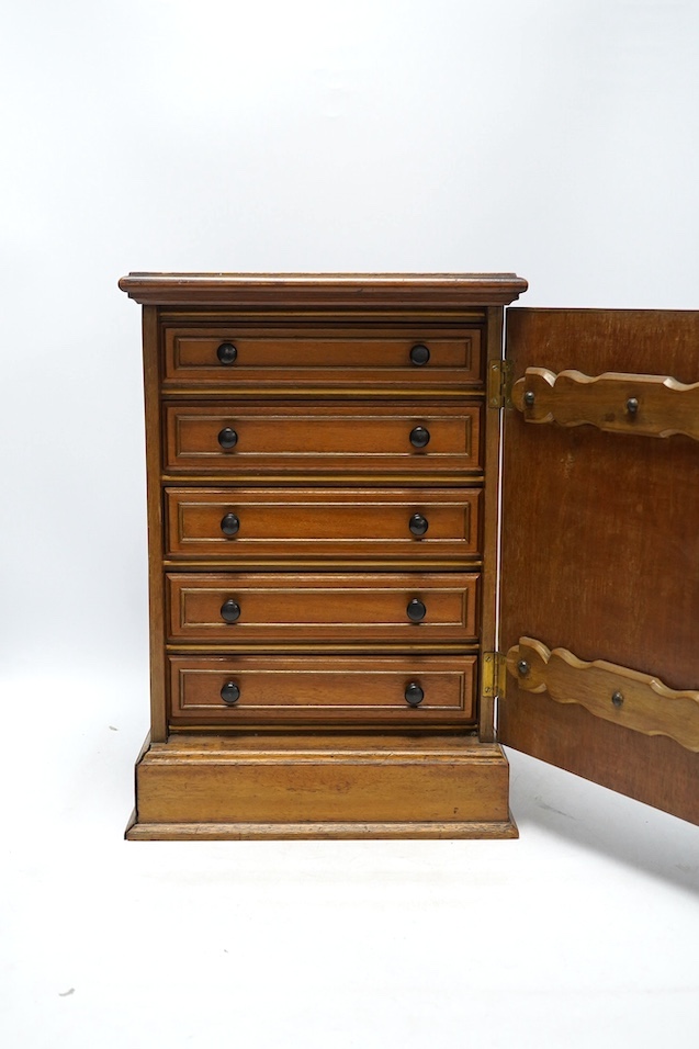 A pair of Victorian Aesthetic period oak table top cabinets, each with five drawers, 38cm high. Condition - fair to good